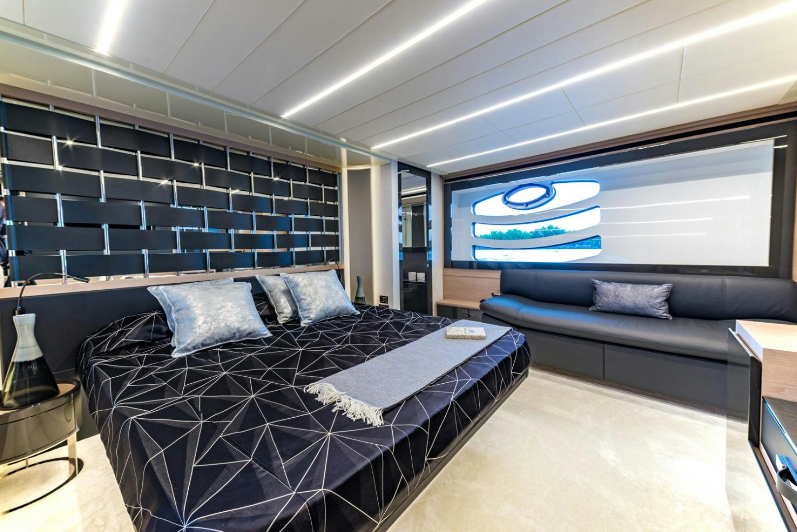 a large bed in a room aboard BAD DADDY Yacht for Sale