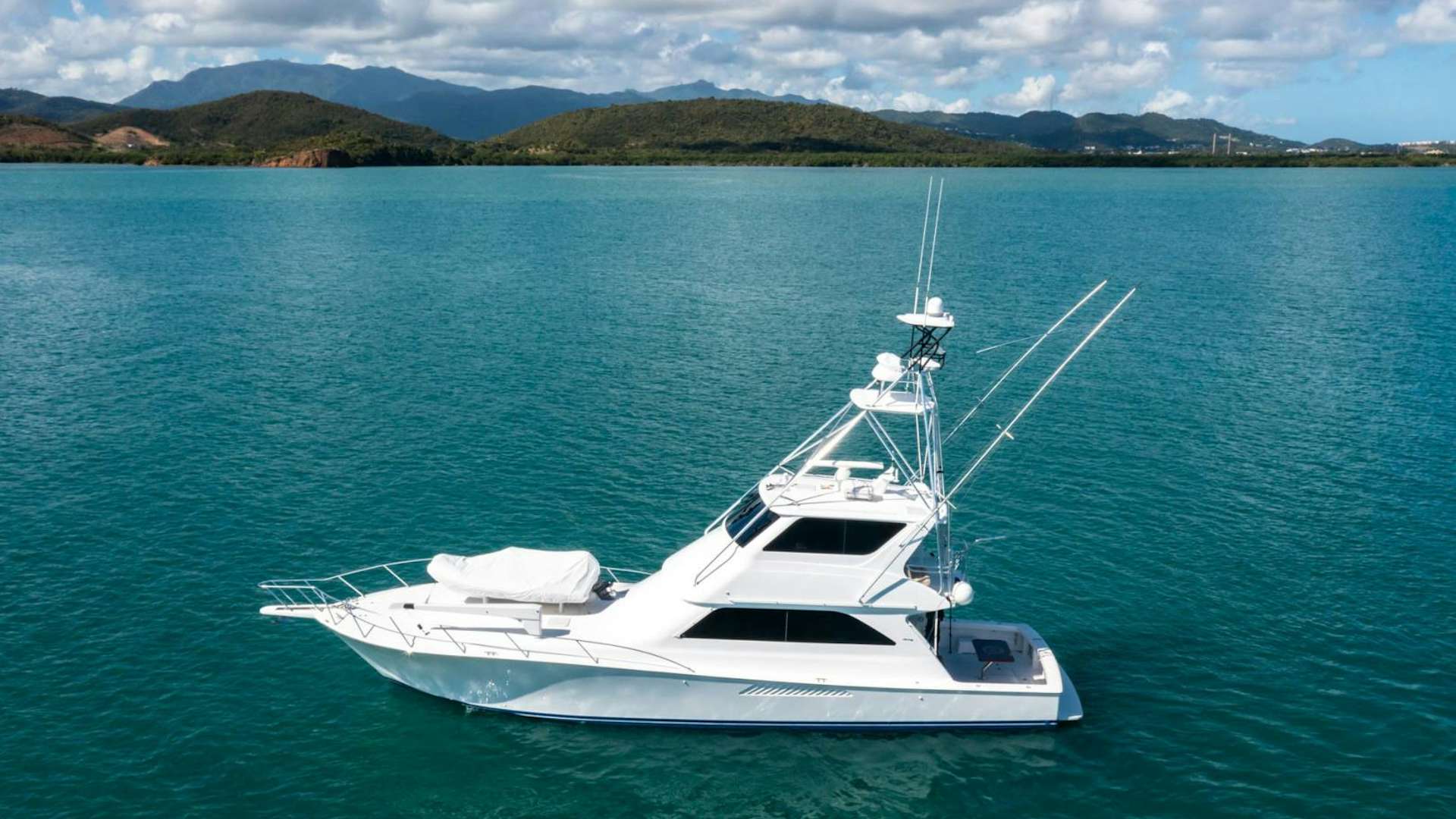 a white boat in the water aboard STEEL LADY Yacht for Sale