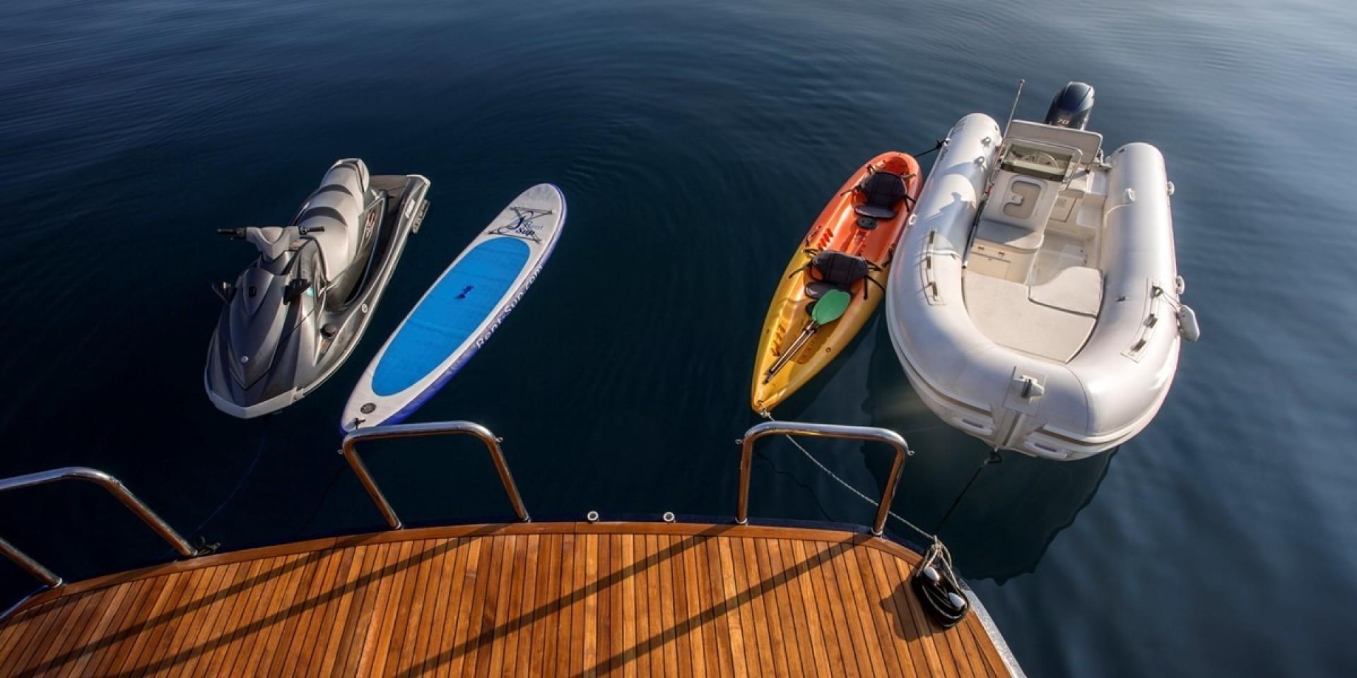 a boat with two kayaks aboard ADRIATIC ESCAPE Yacht for Sale