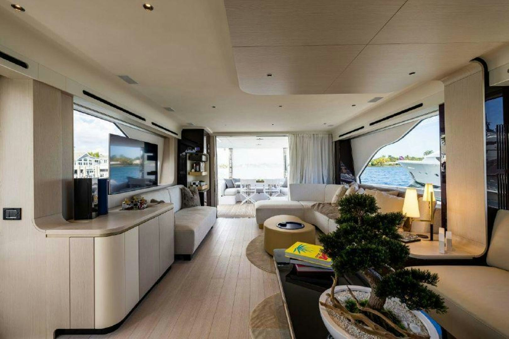 a living room with a large window aboard SUN LIFE Yacht for Sale