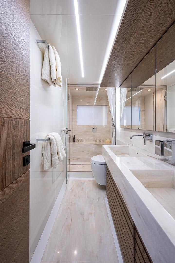 a bathroom with a sink and toilet aboard LEBRADA Yacht for Sale