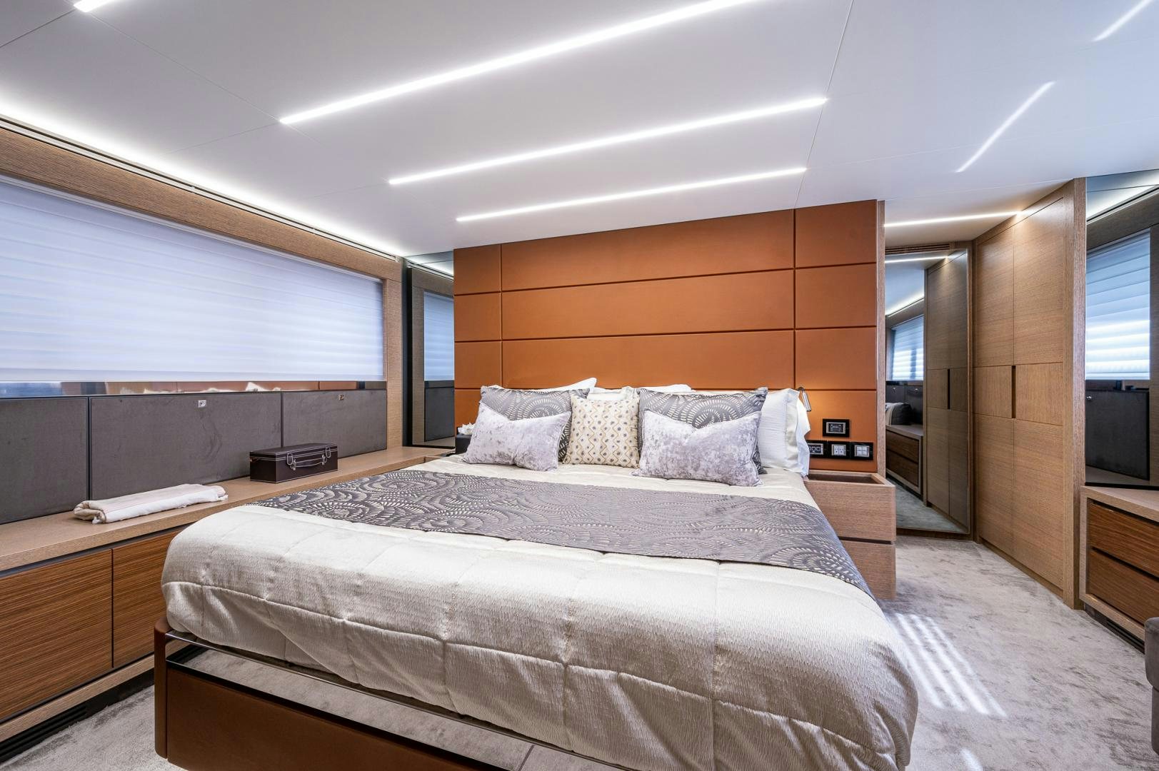 a large bed in a room aboard LEBRADA Yacht for Sale