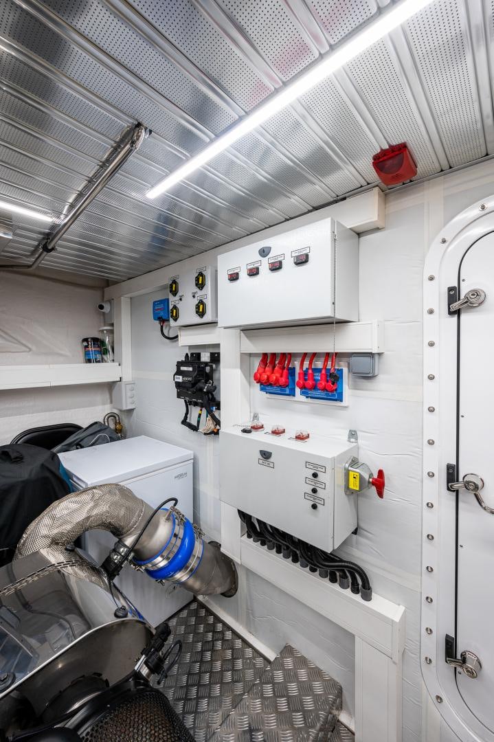 a room with a machine aboard LEBRADA Yacht for Sale