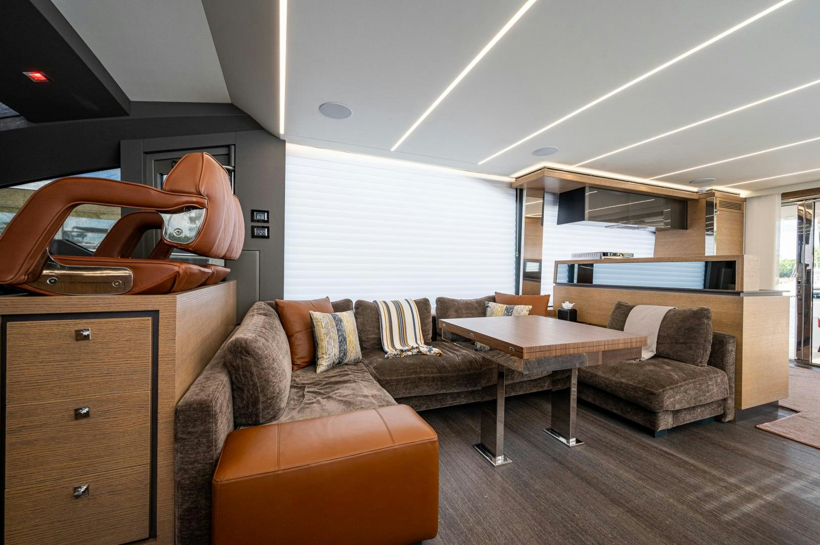 a living room with a couch and a table aboard LEBRADA Yacht for Sale