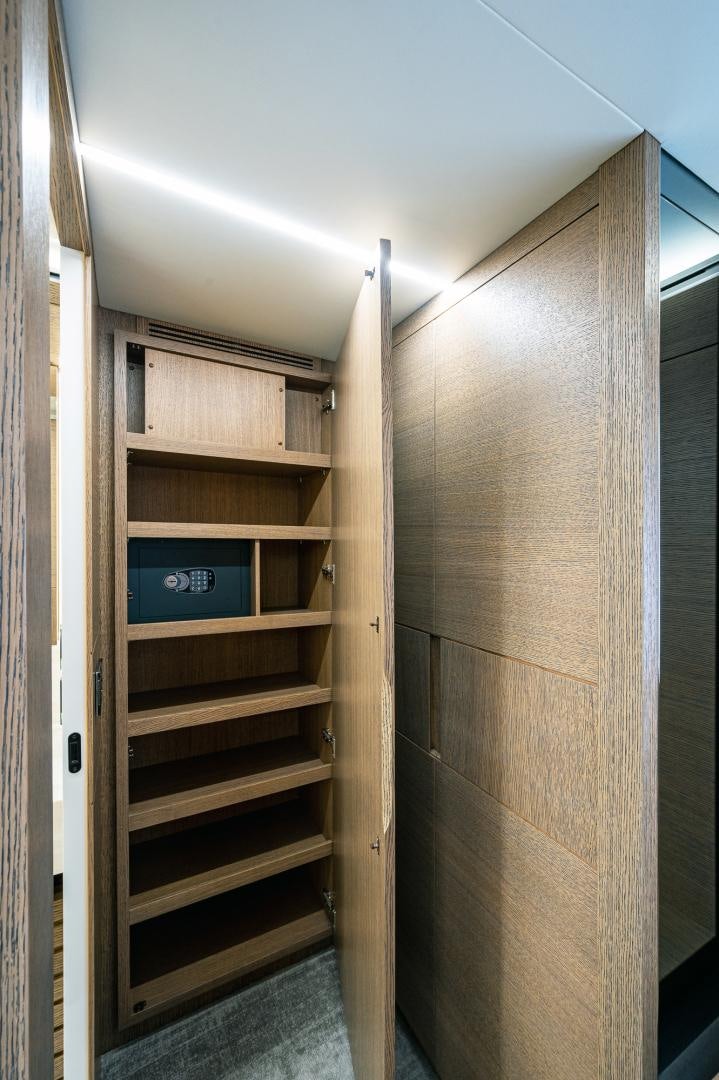 a wooden cabinet with a sign on it aboard LEBRADA Yacht for Sale