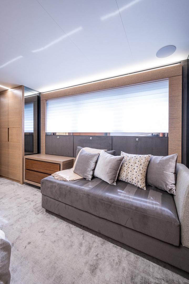a couch in a room aboard LEBRADA Yacht for Sale