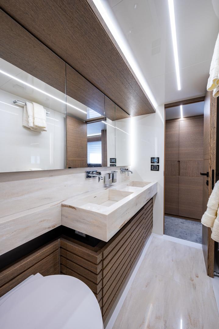 a bathroom with a sink and a toilet aboard LEBRADA Yacht for Sale