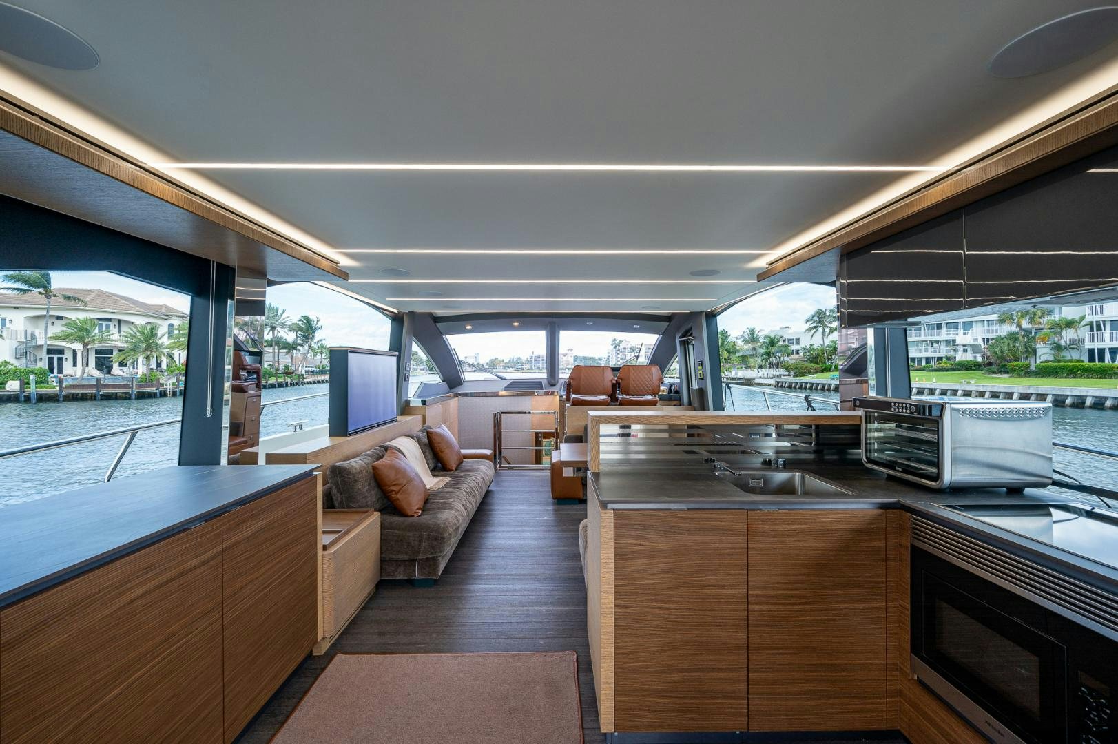 a room with a view of the city aboard LEBRADA Yacht for Sale