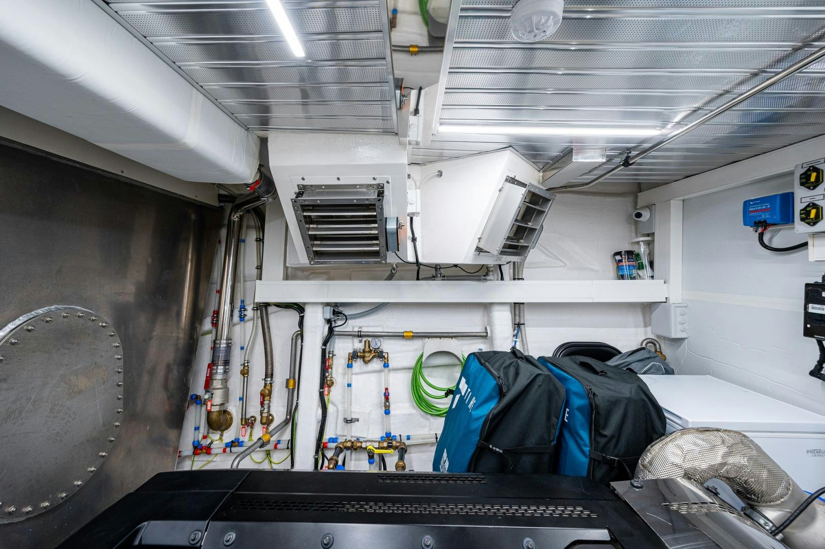 a large room with machinery aboard LEBRADA Yacht for Sale