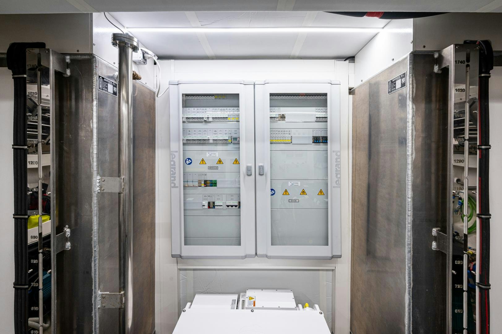 a room with several lockers aboard LEBRADA Yacht for Sale