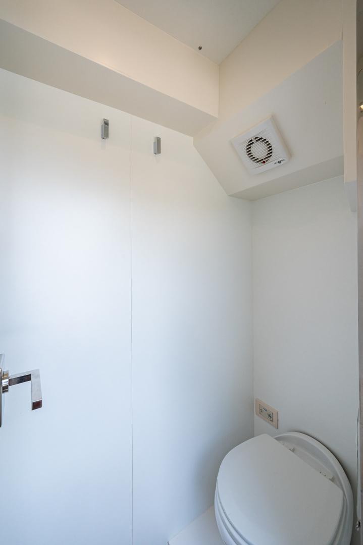a small bathroom with a toilet aboard LEBRADA Yacht for Sale