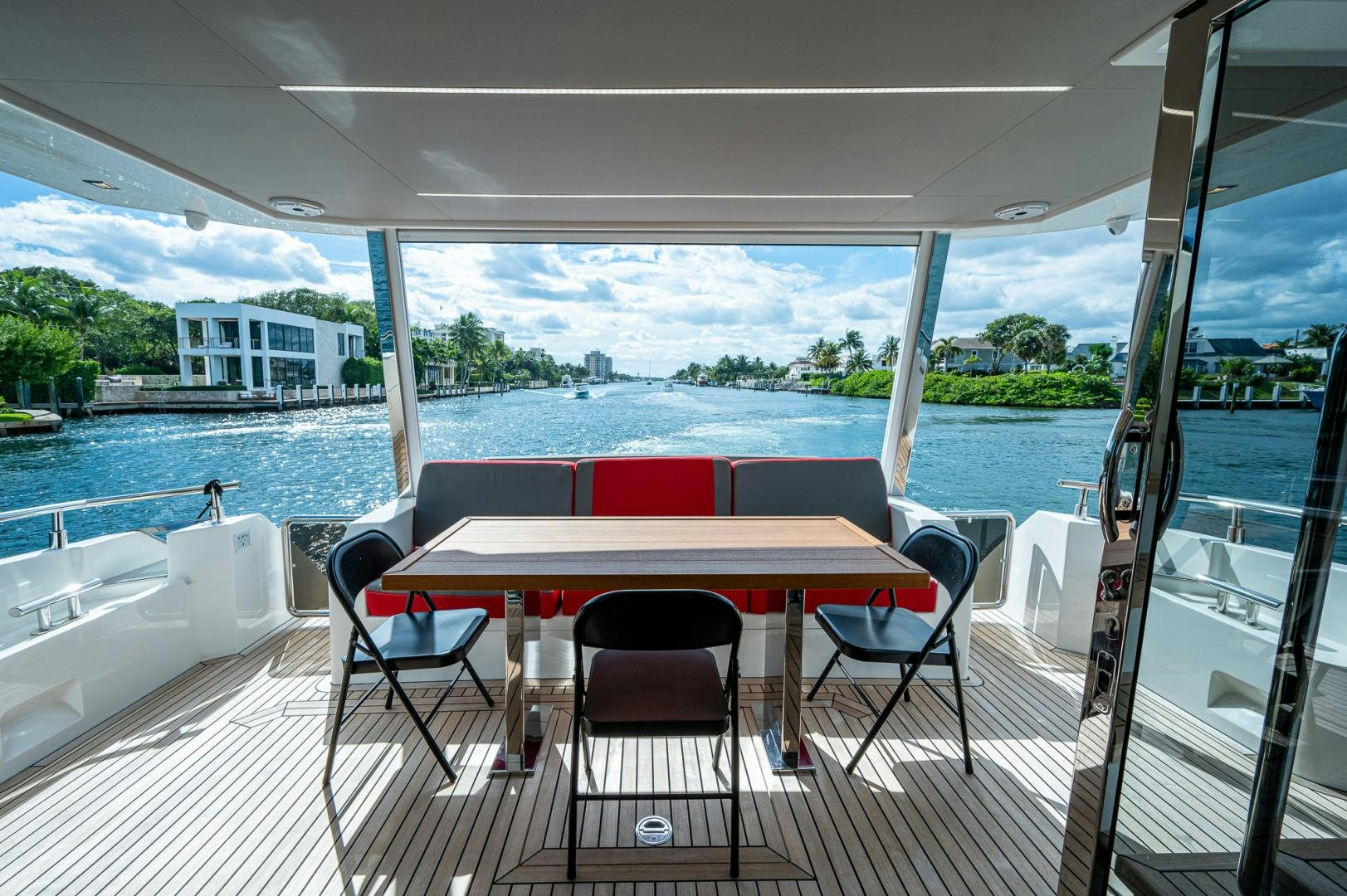 a table and chairs on a boat aboard LEBRADA Yacht for Sale