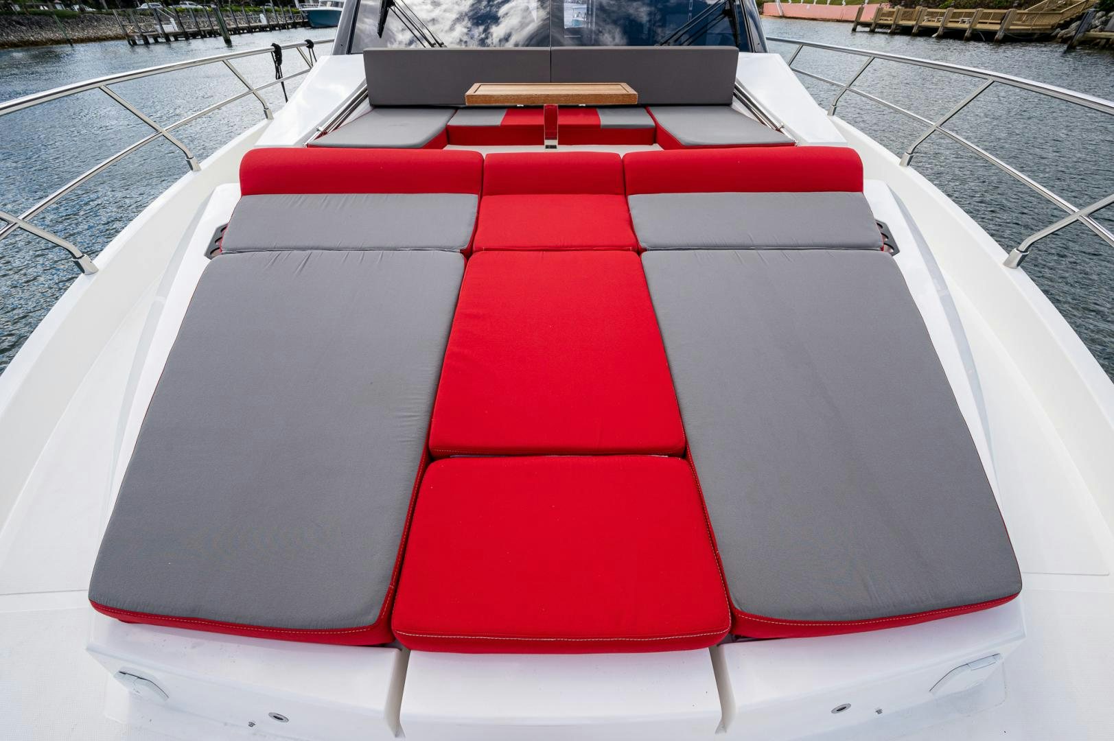a red and white chair aboard LEBRADA Yacht for Sale