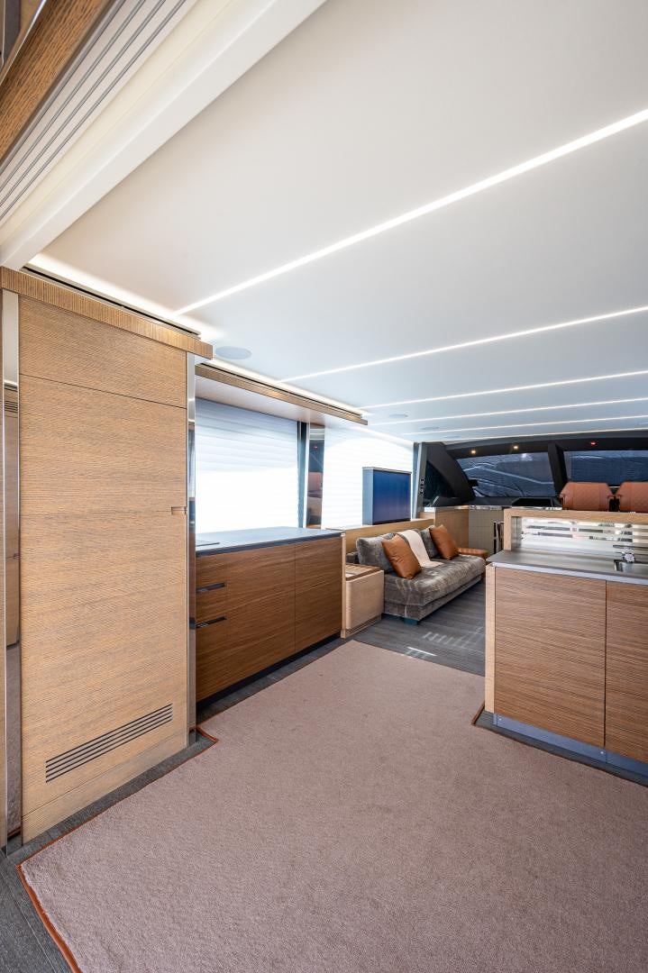 a room with a couch and a table aboard LEBRADA Yacht for Sale