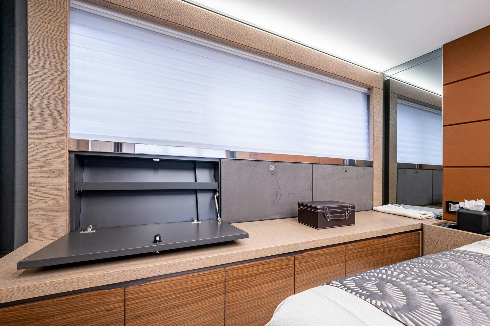 a tv on a shelf aboard LEBRADA Yacht for Sale