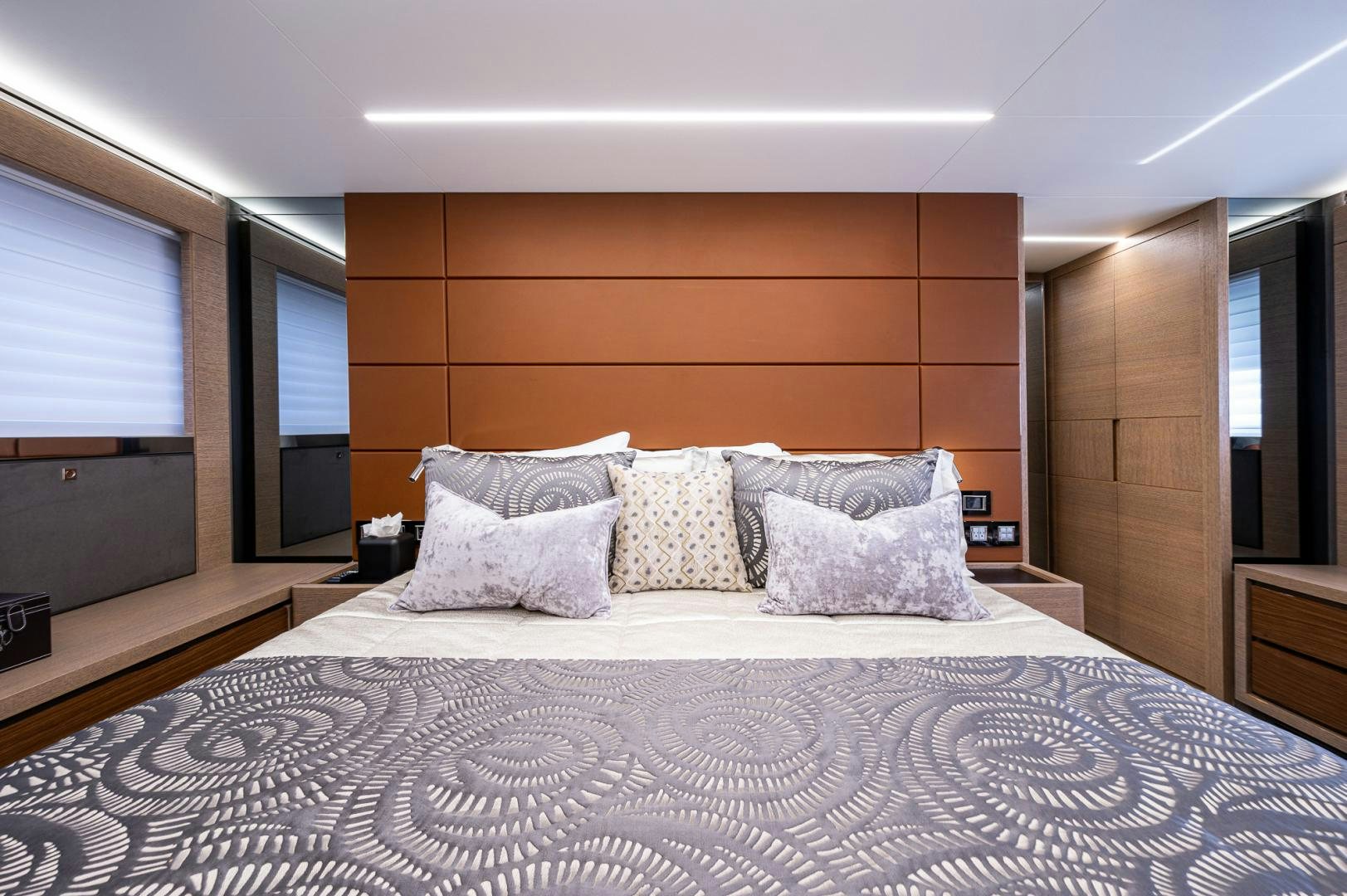 a large bed with pillows aboard LEBRADA Yacht for Sale