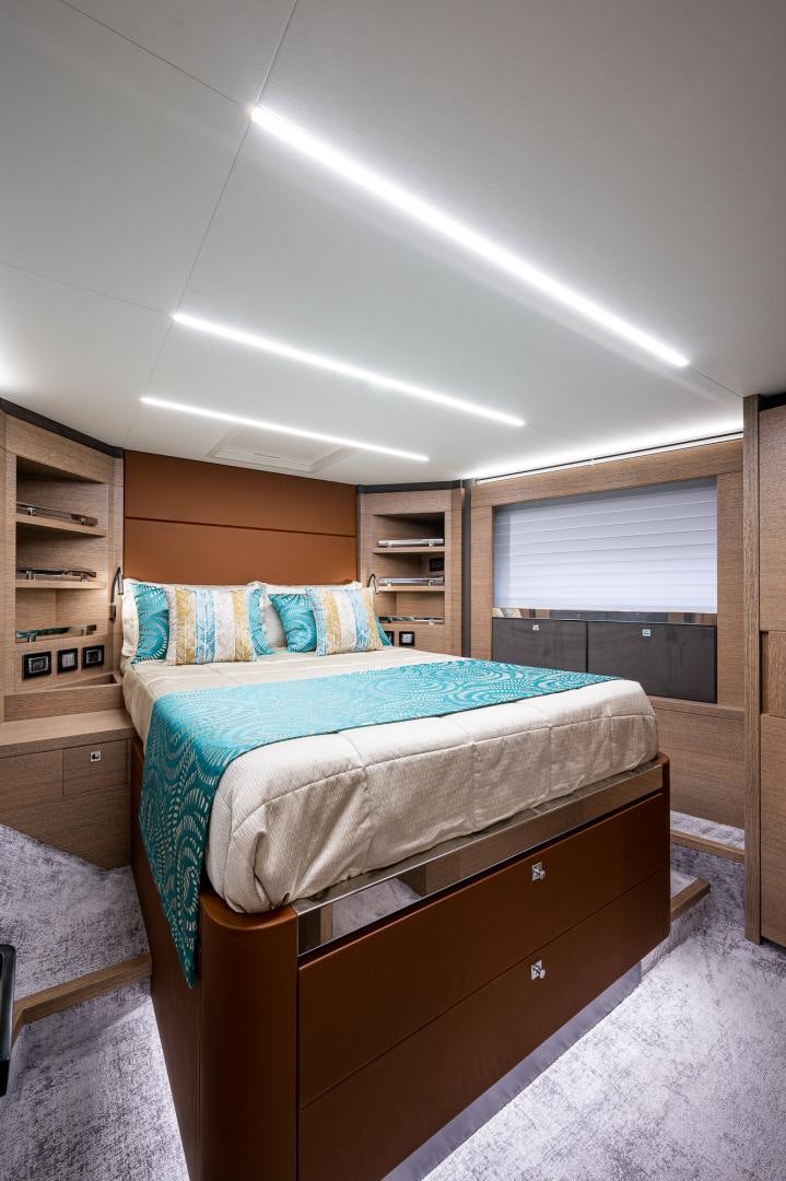 a bed in a room aboard LEBRADA Yacht for Sale