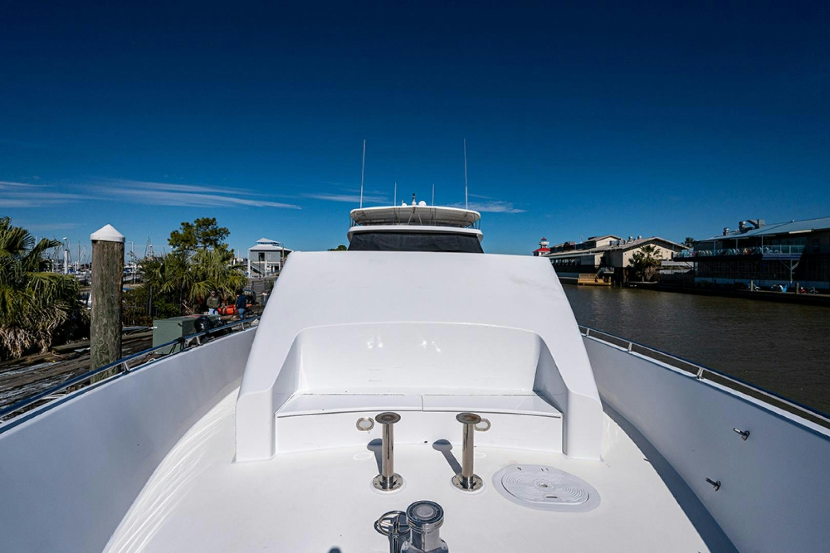 a white boat on a body of water aboard CANDY WORLD Yacht for Sale