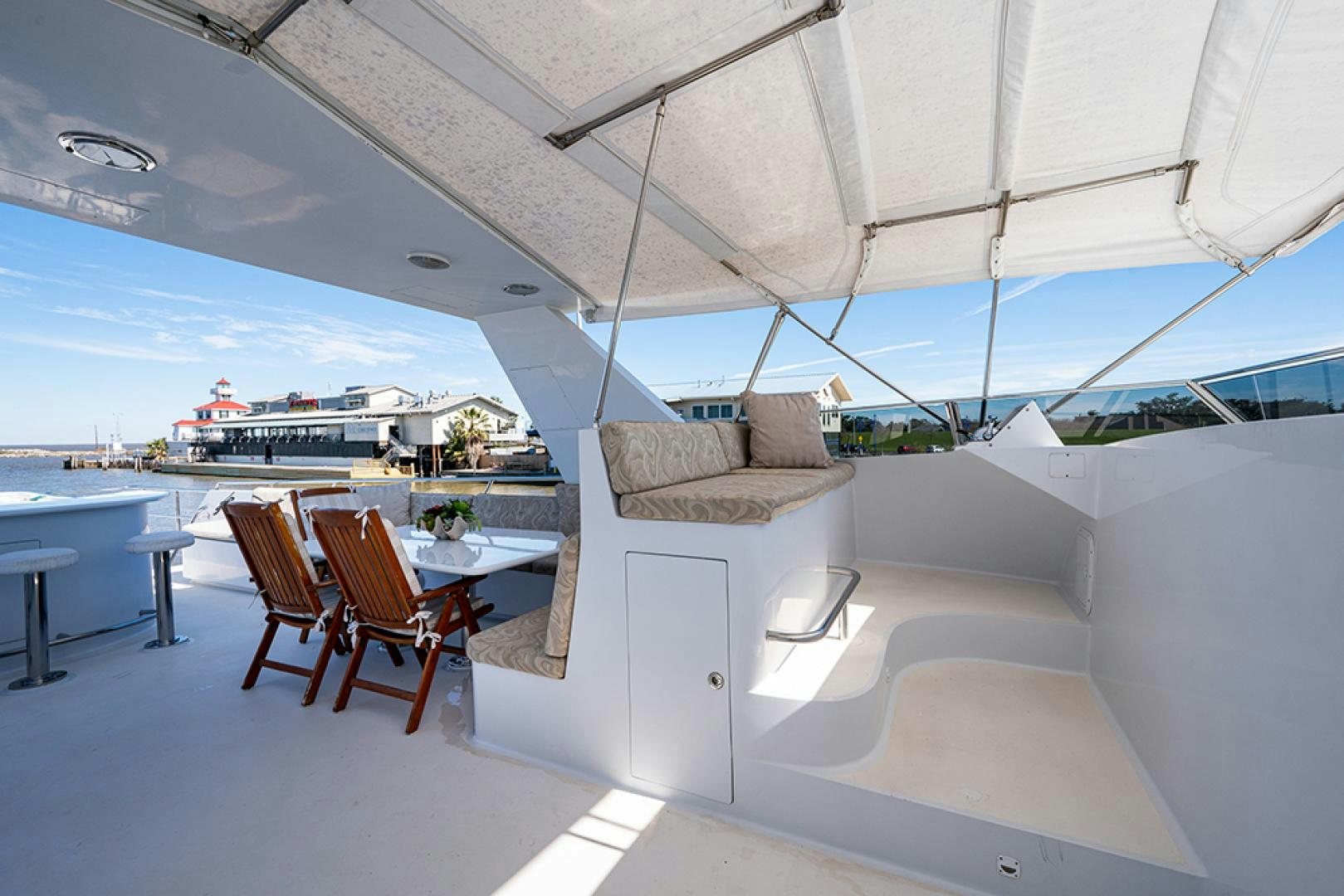 a room with a couch and chairs aboard CANDY WORLD Yacht for Sale
