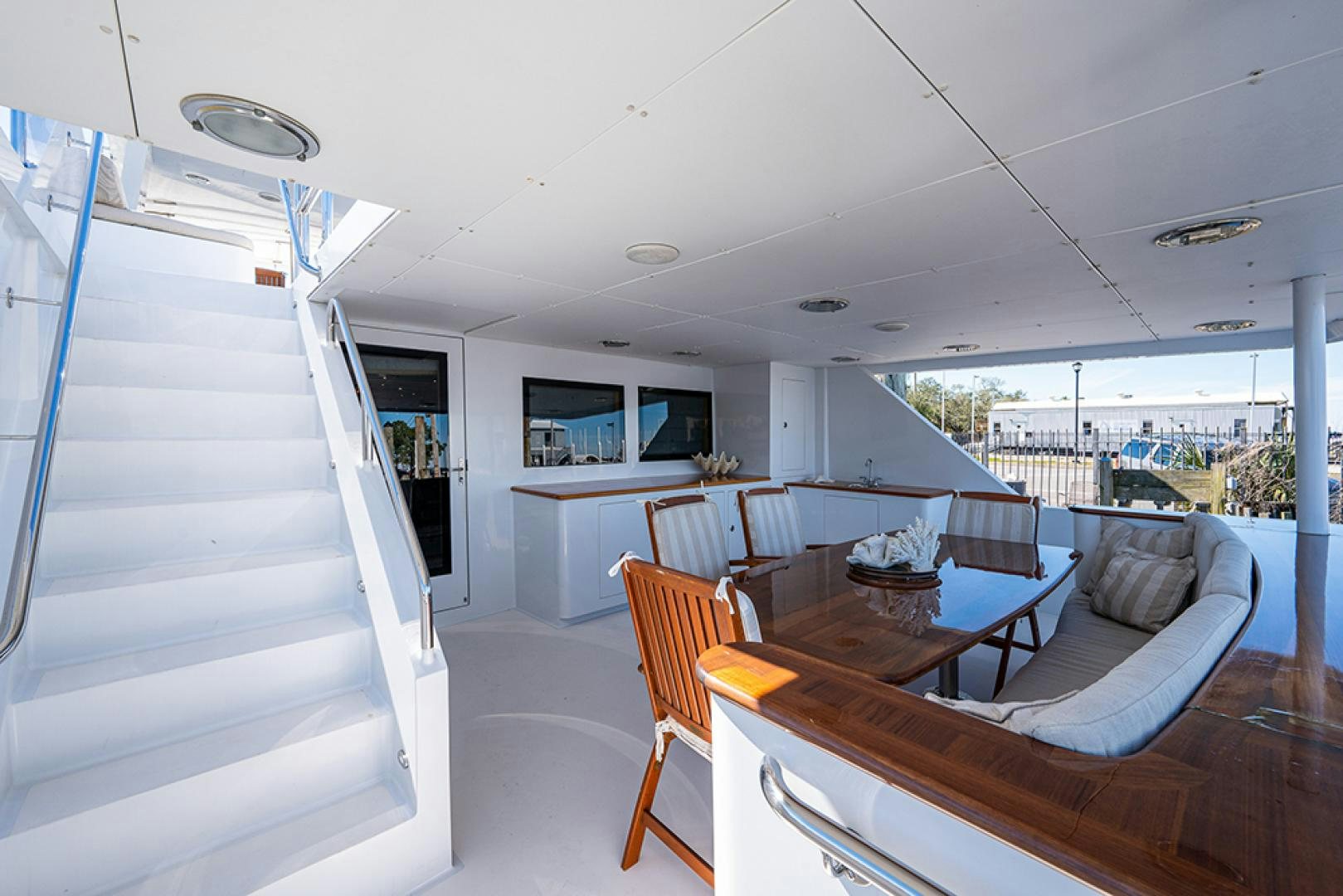 a large open living room with a balcony aboard CANDY WORLD Yacht for Sale