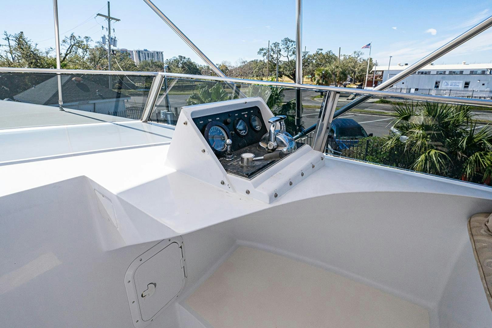 a white car with a steering wheel aboard CANDY WORLD Yacht for Sale