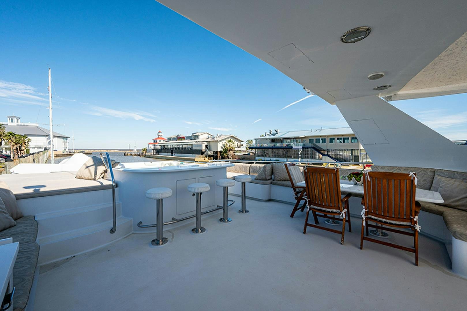 a group of chairs outside a building aboard CANDY WORLD Yacht for Sale