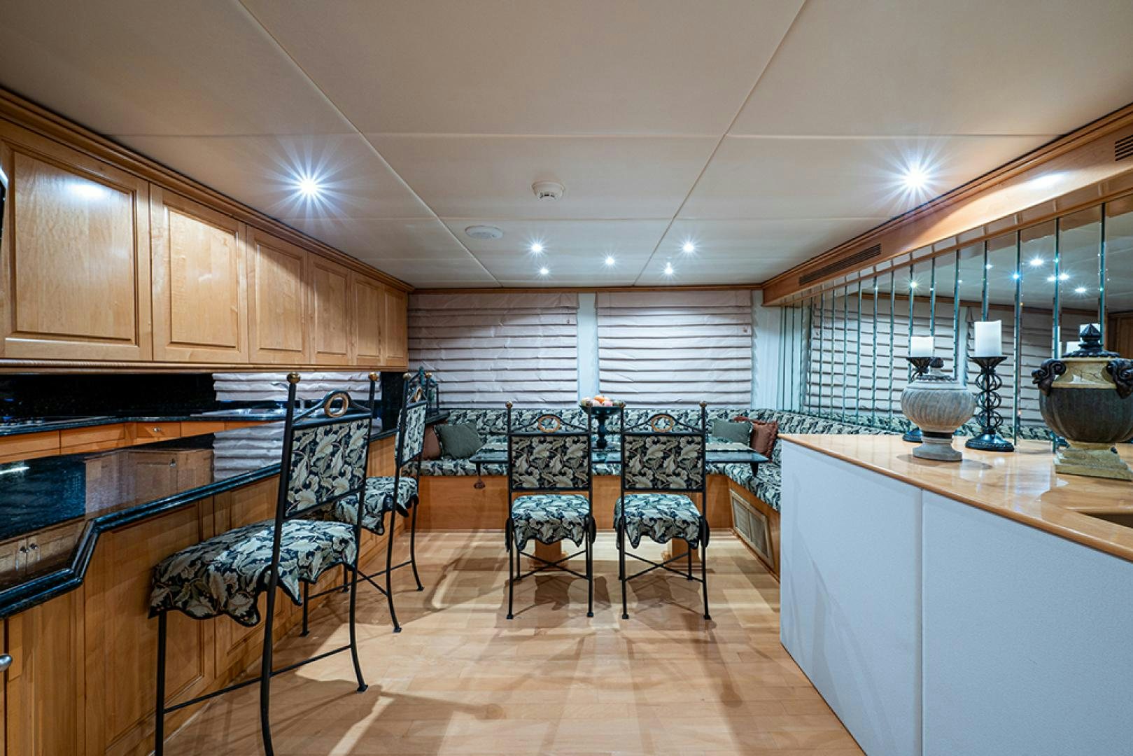 a large kitchen with wooden cabinets aboard CANDY WORLD Yacht for Sale