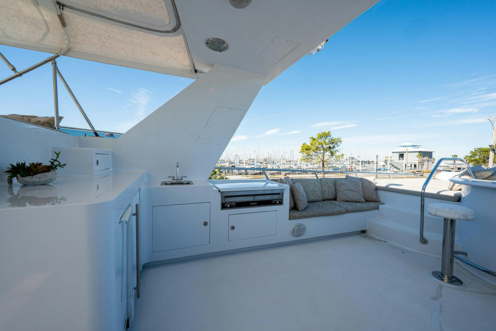 a room with a couch and a table and a bed aboard CANDY WORLD Yacht for Sale