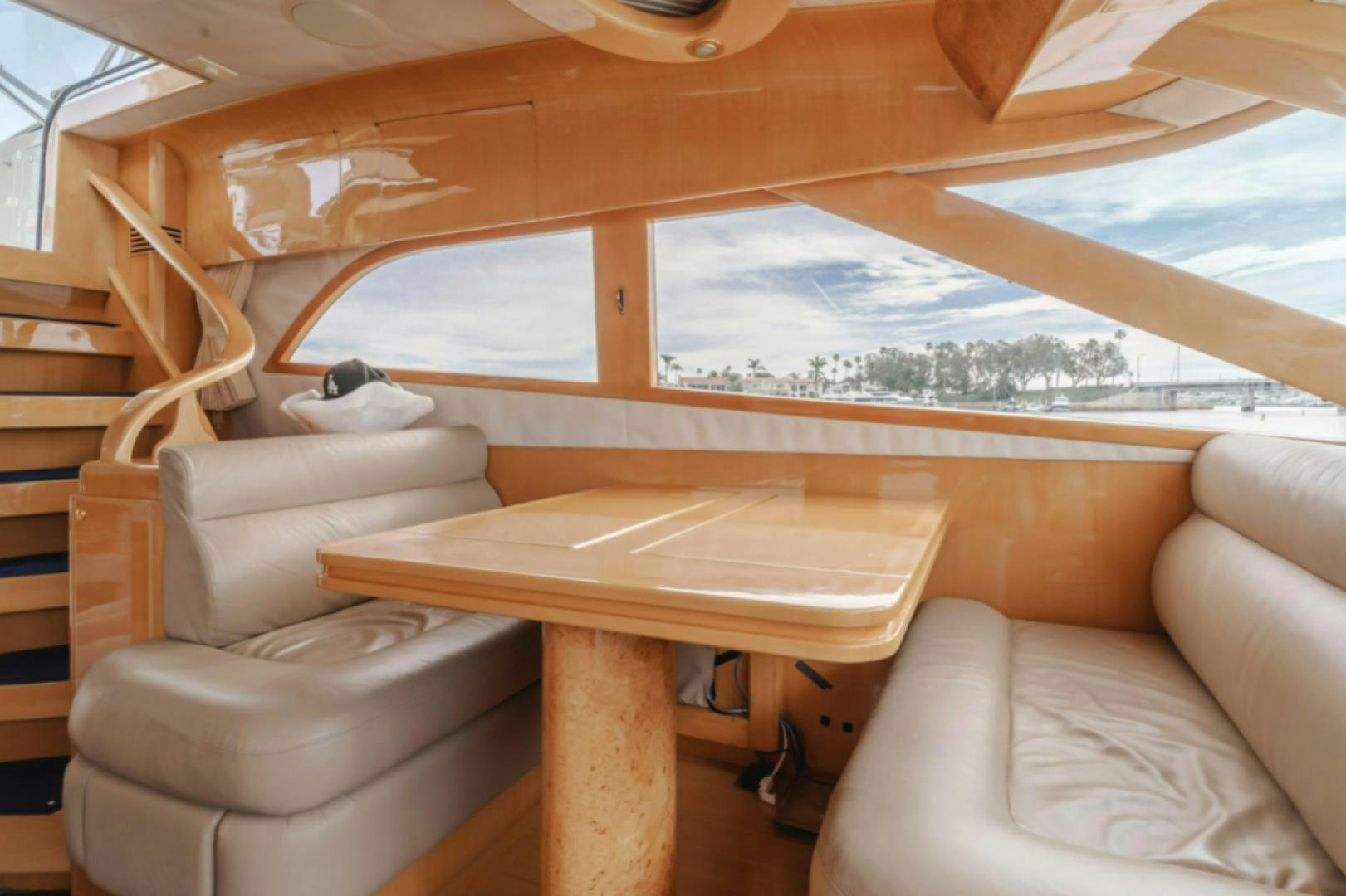a room with a table and chairs aboard no exceptions Yacht for Sale