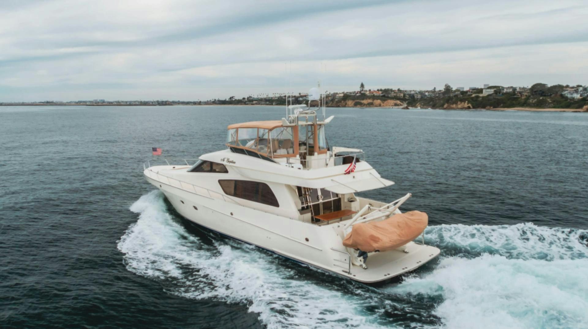 a boat on the water aboard no exceptions Yacht for Sale