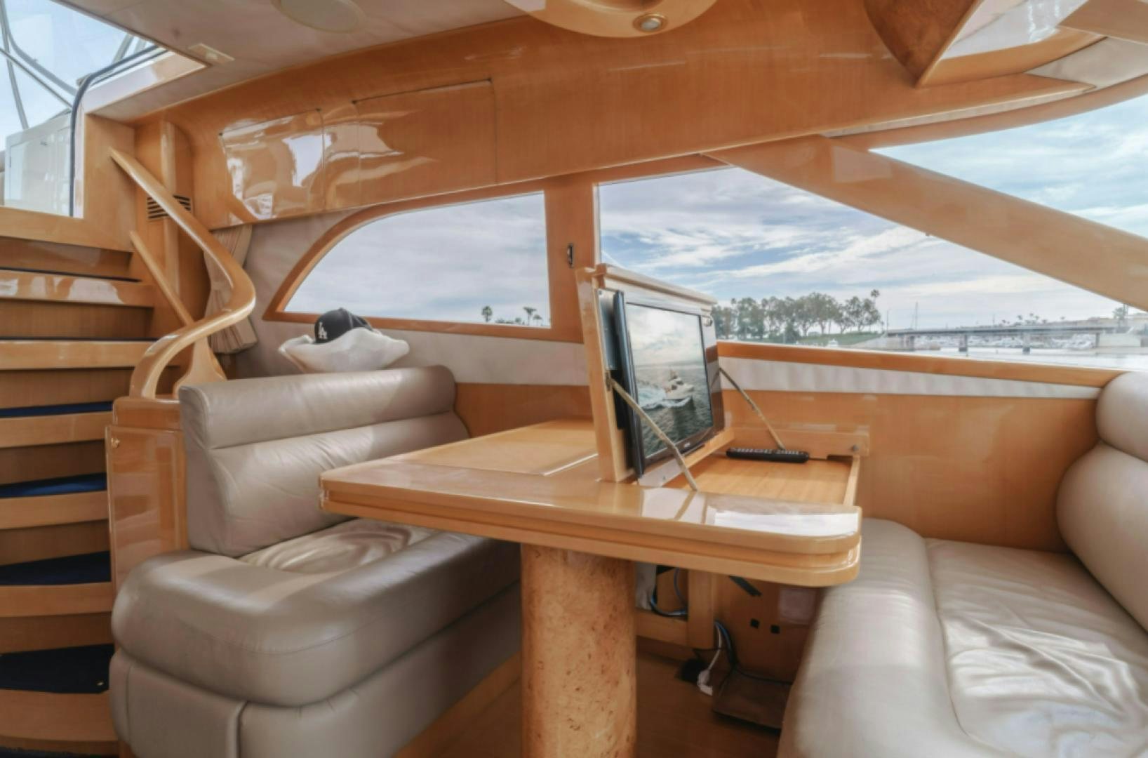 a room with a bed and a desk aboard no exceptions Yacht for Sale