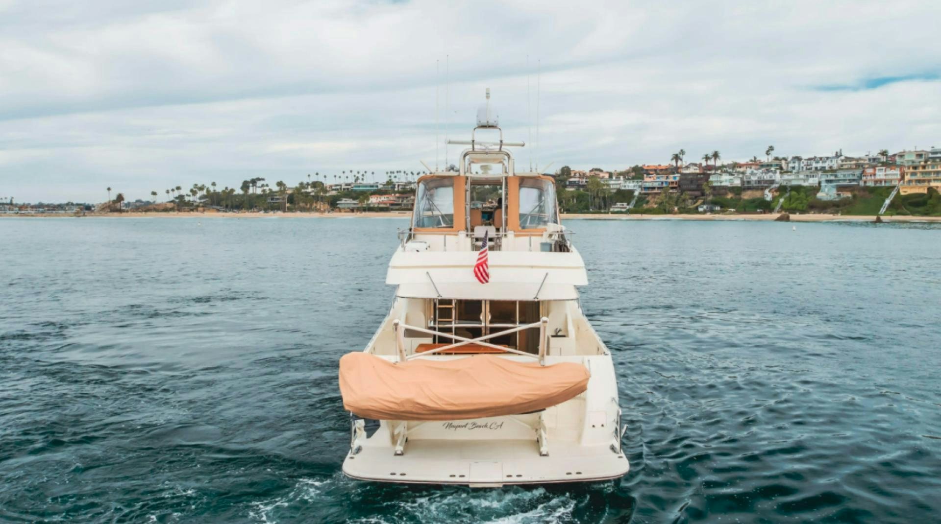 a boat in the water aboard no exceptions Yacht for Sale