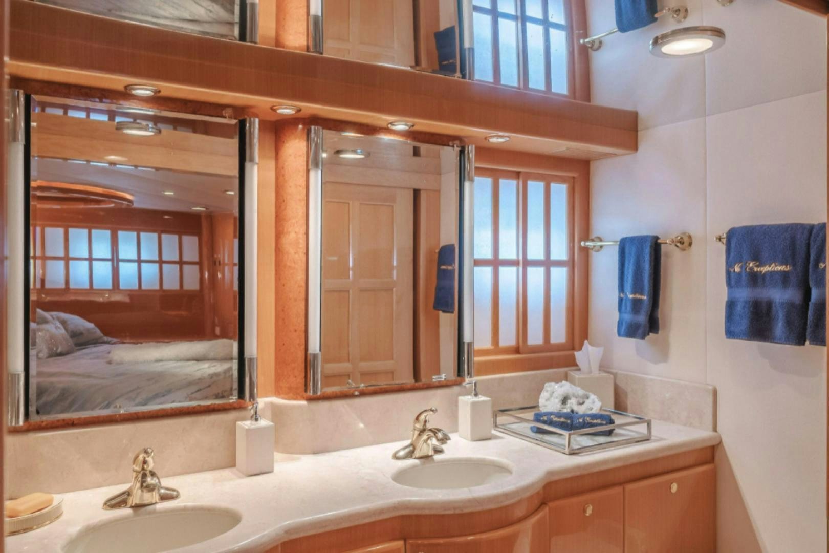a bathroom with a large mirror aboard no exceptions Yacht for Sale