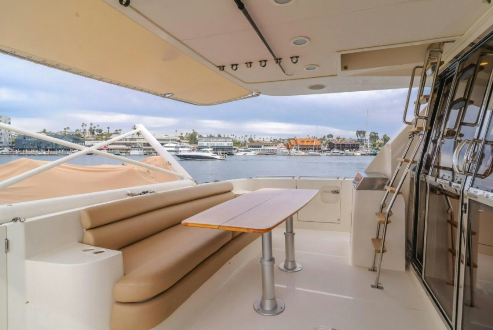 a room with a table and chairs aboard no exceptions Yacht for Sale
