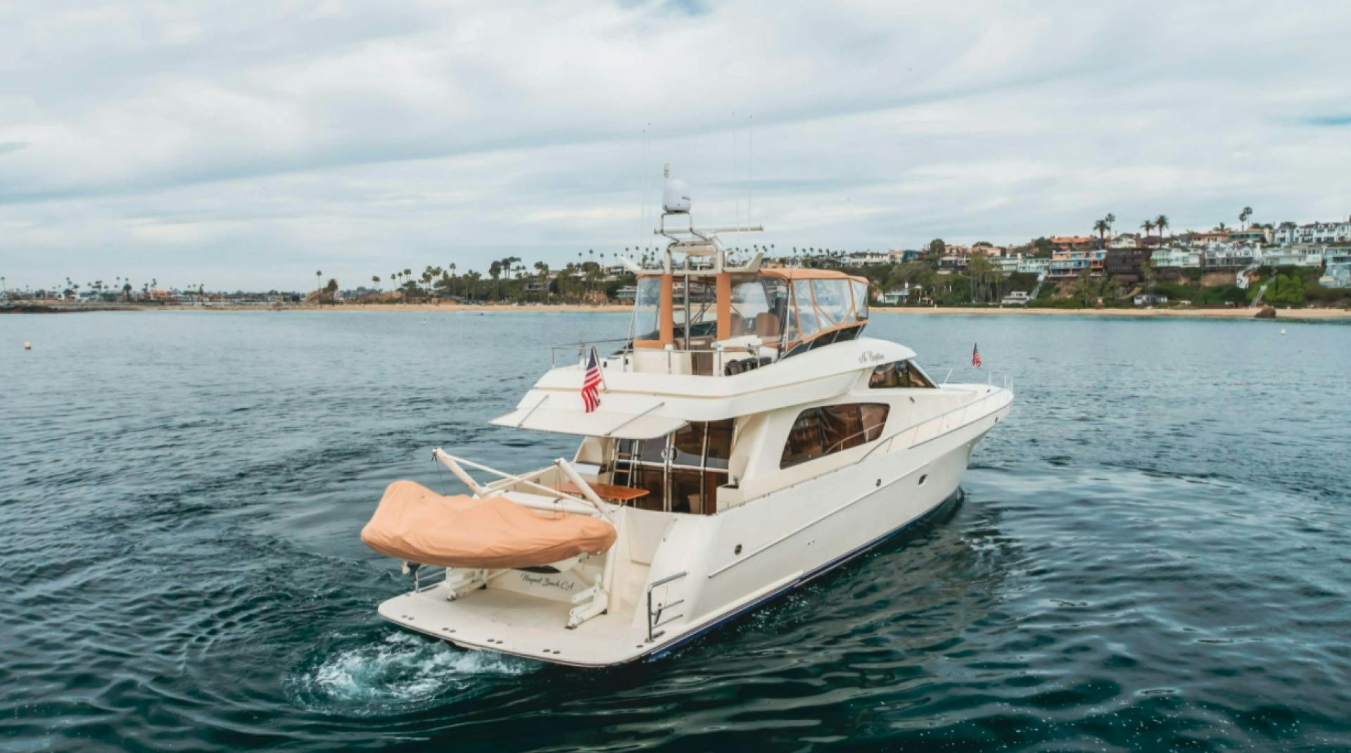 a boat on the water aboard no exceptions Yacht for Sale