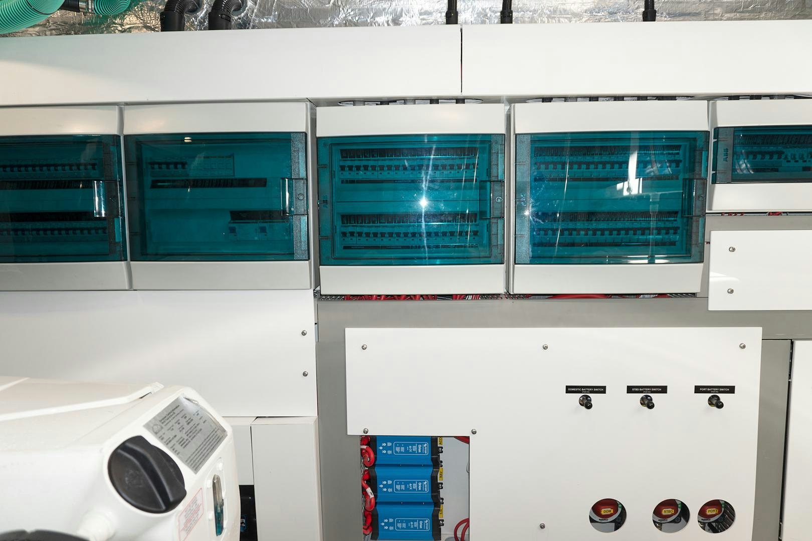 a computer with a screen and a window aboard YOUNG HEARTS Yacht for Sale