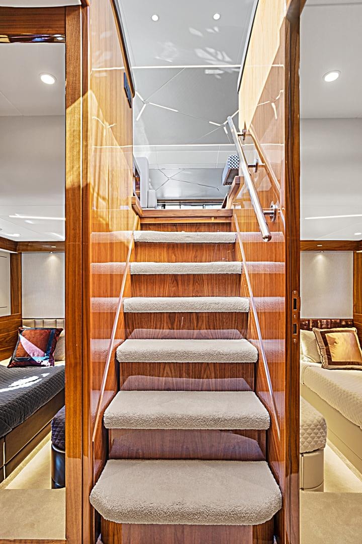 a set of stairs in a room aboard YOUNG HEARTS Yacht for Sale