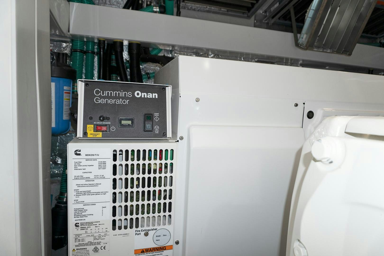a white machine with a label aboard YOUNG HEARTS Yacht for Sale