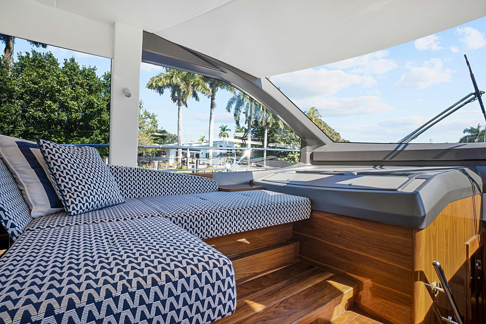 a room with a view of the ocean and the ocean aboard YOUNG HEARTS Yacht for Sale