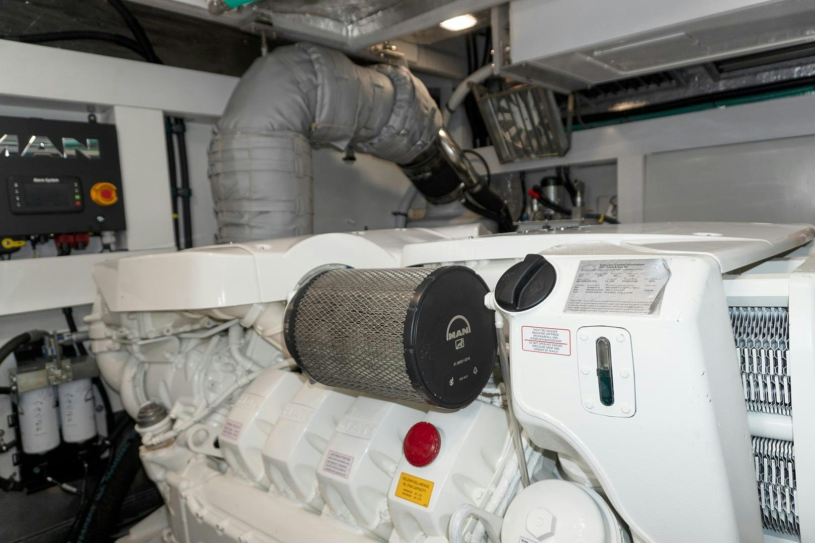 a machine with a large piece of equipment on it aboard YOUNG HEARTS Yacht for Sale