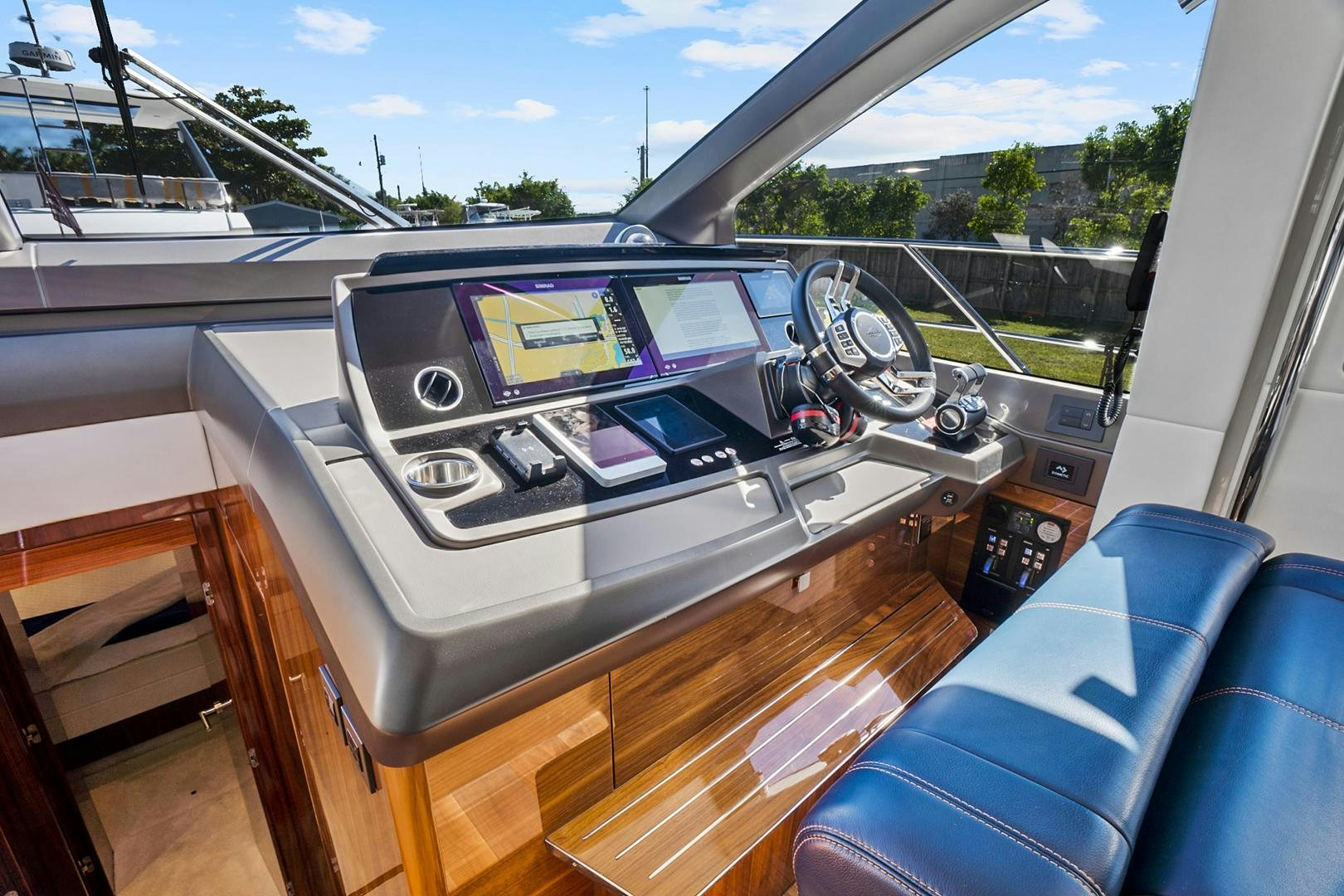 inside of a car aboard YOUNG HEARTS Yacht for Sale