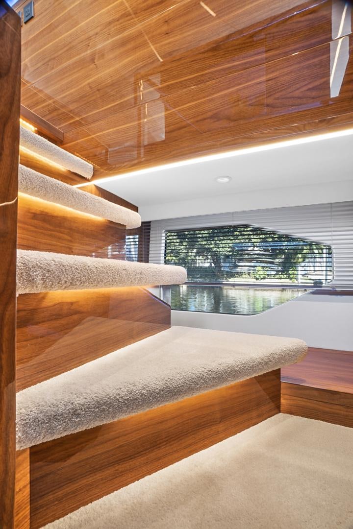 a room with a bed and a window aboard YOUNG HEARTS Yacht for Sale