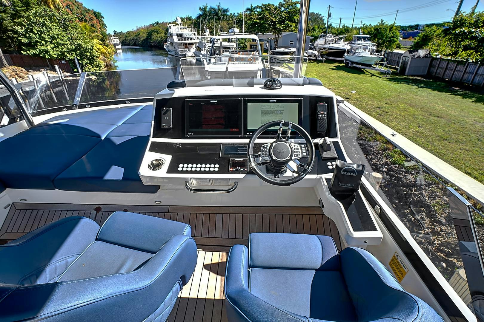 a car on a boat aboard YOUNG HEARTS Yacht for Sale