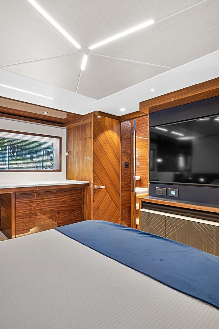a bed in a room aboard YOUNG HEARTS Yacht for Sale