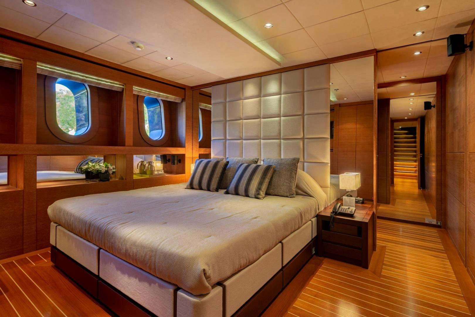 a bed in a room aboard ZALIV III Yacht for Sale