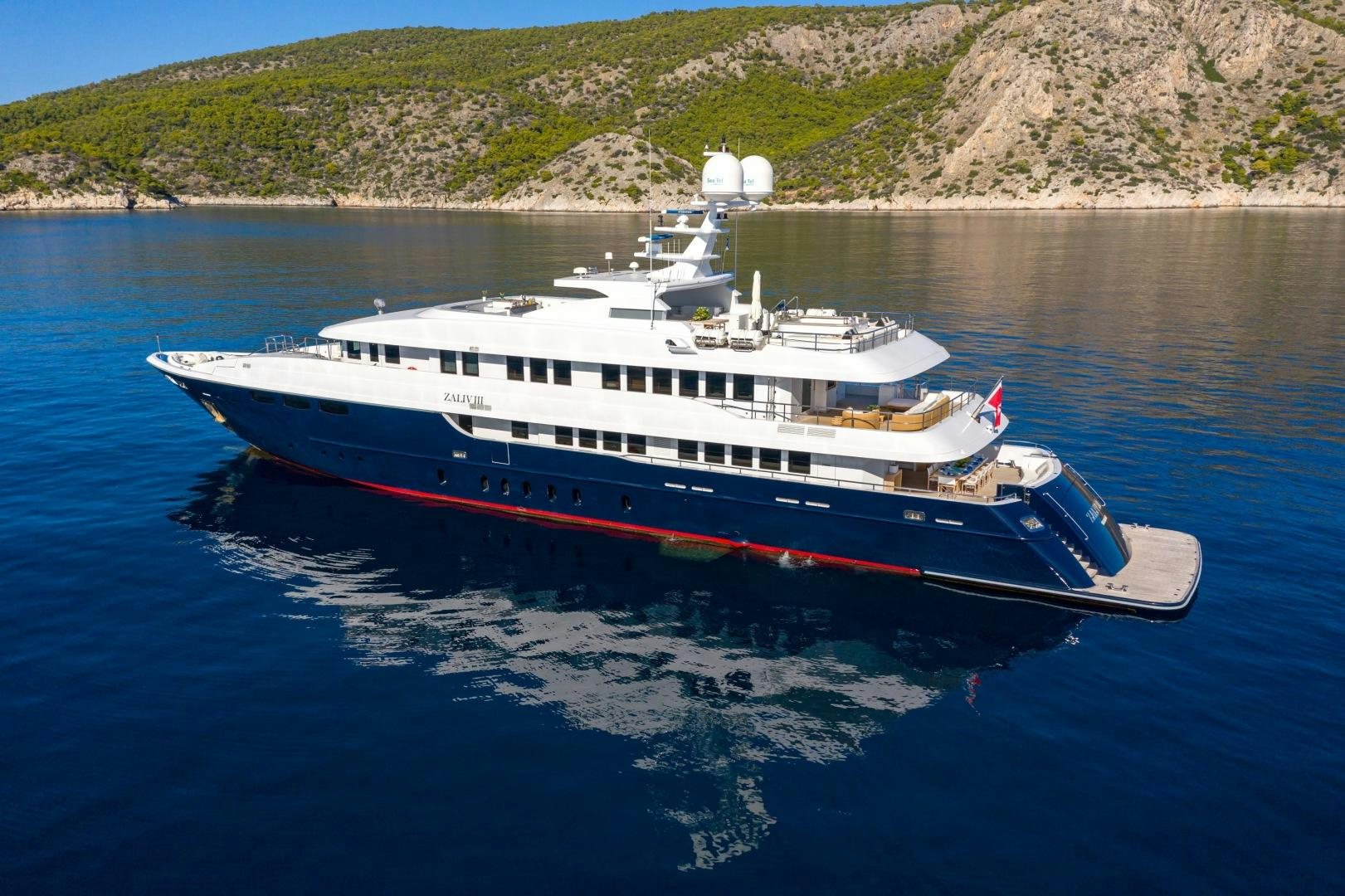 a large boat on the water aboard ZALIV III Yacht for Sale