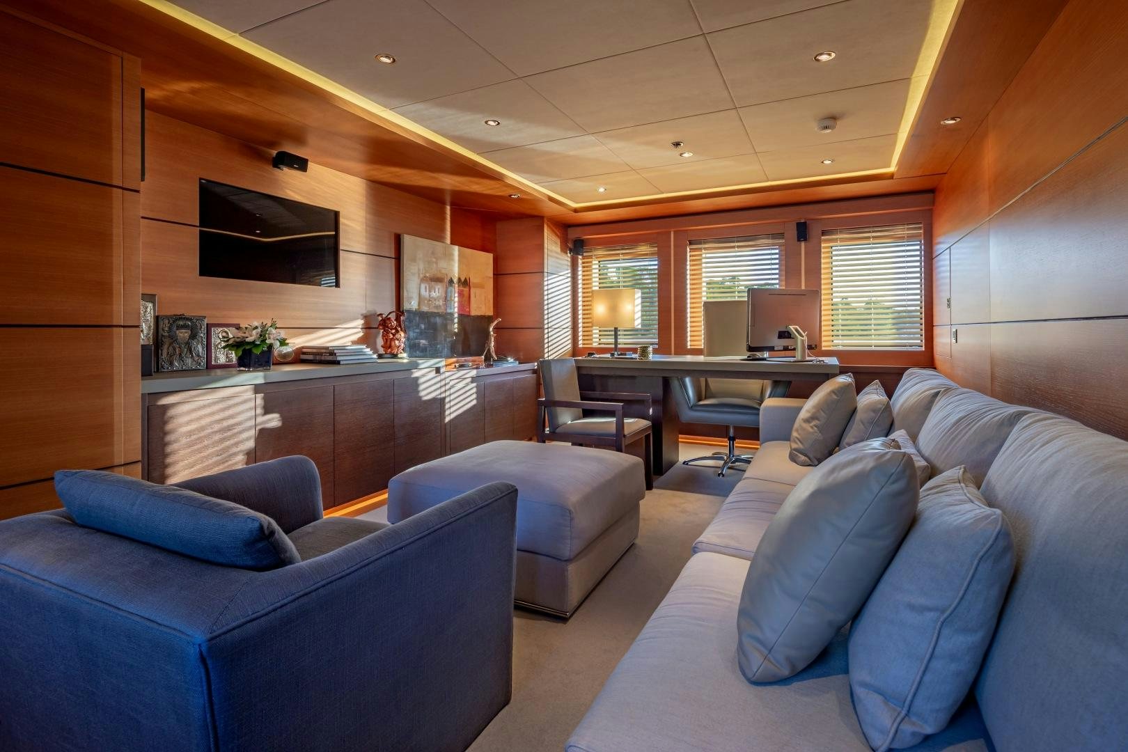 a living room with a couch and a tv aboard ZALIV III Yacht for Sale