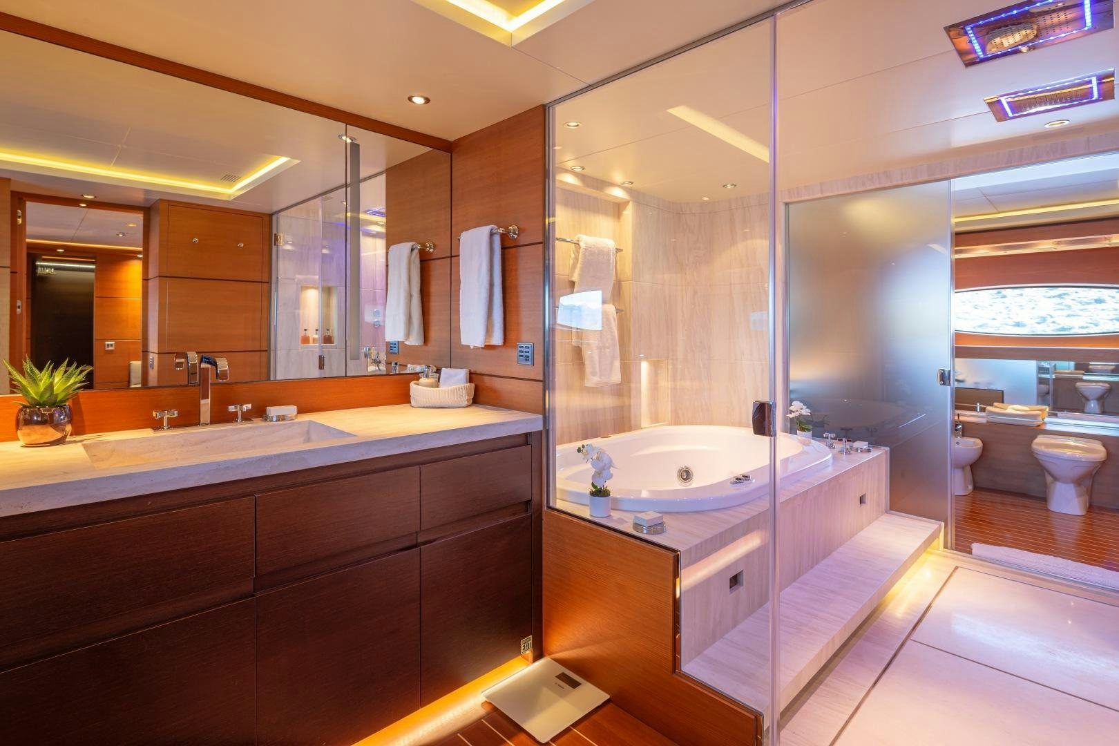 a bathroom with a large tub aboard ZALIV III Yacht for Sale