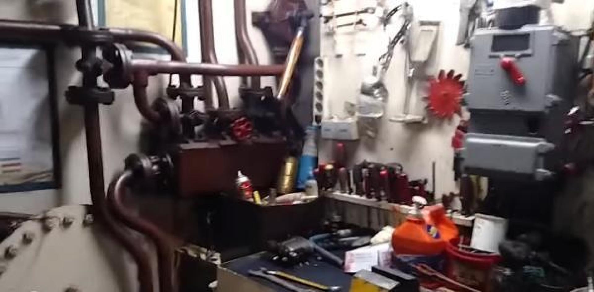 a room with machinery and tools aboard WANDERBIRD Yacht for Sale