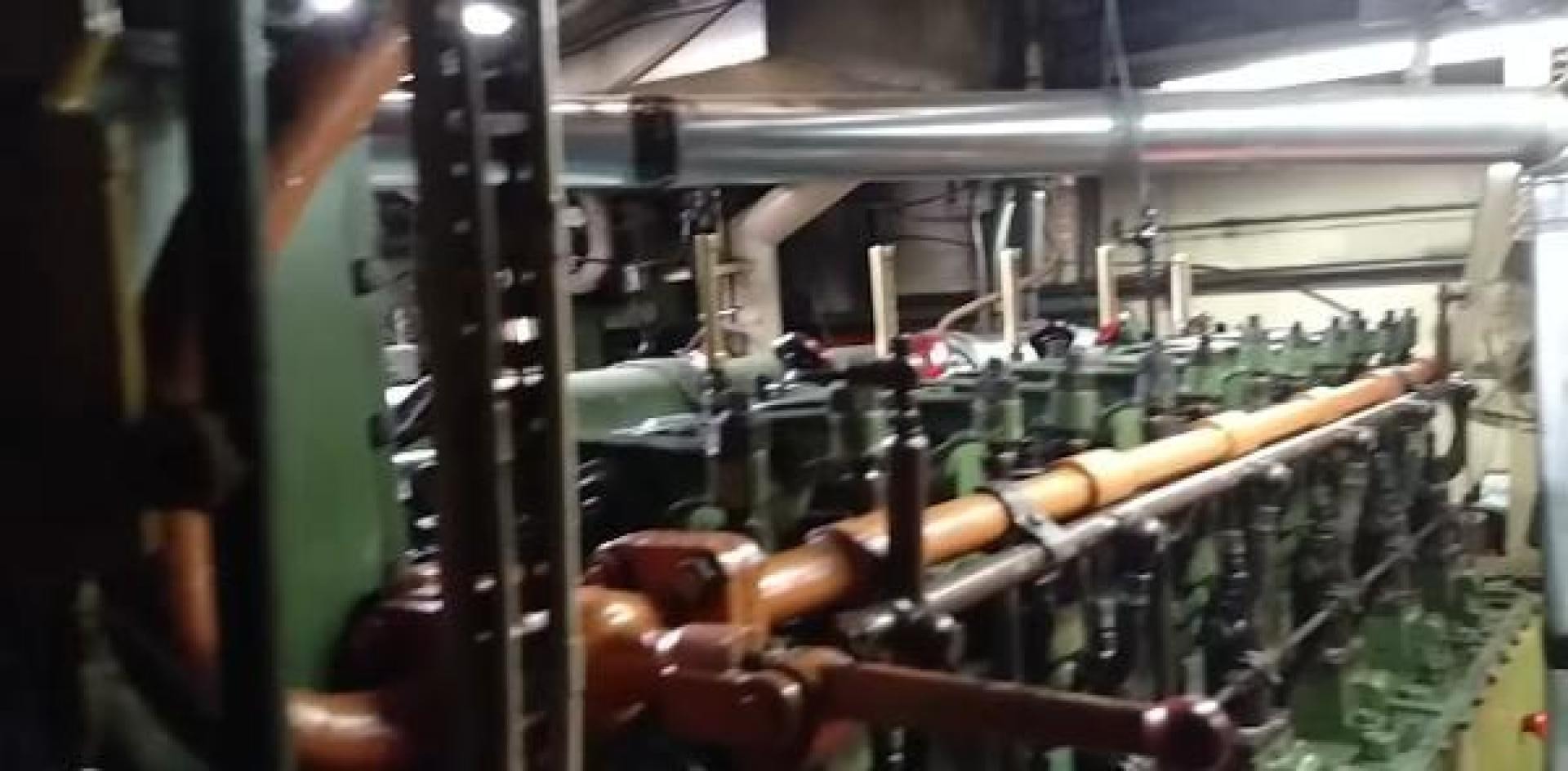 a group of people in a factory aboard WANDERBIRD Yacht for Sale